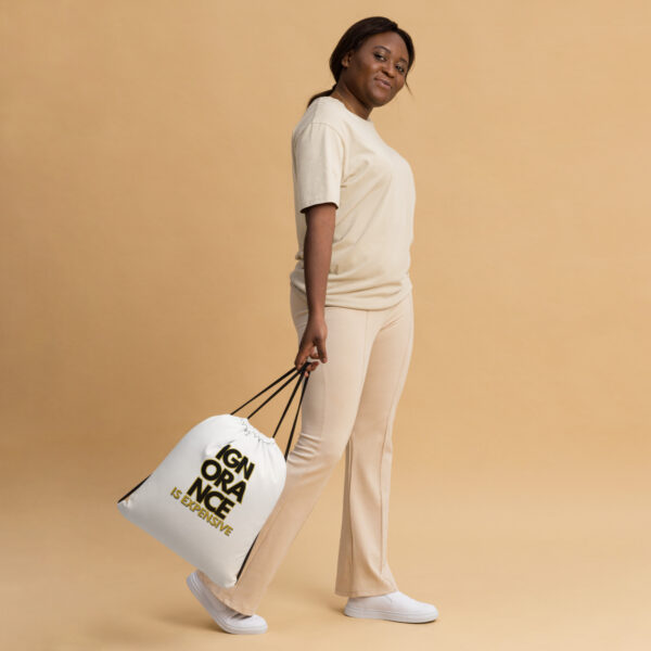Ignorance is Expensive White Drawstring bag